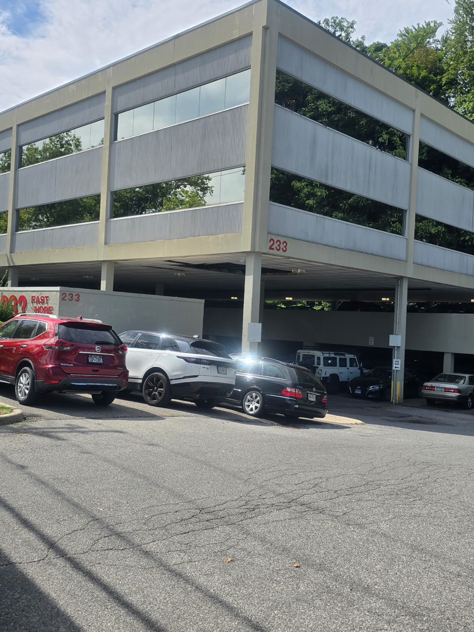 The office building at 233 E Shore Rd in Great Neck, New York, where Elite Audiology PC is located
